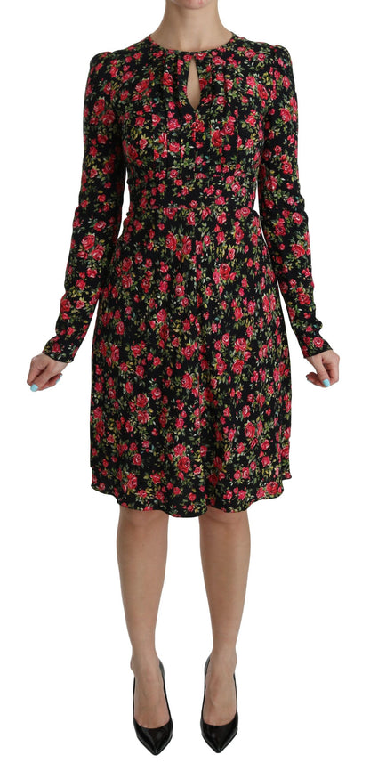 Robe noire à manches longues et à fleurs, longueur aux genoux