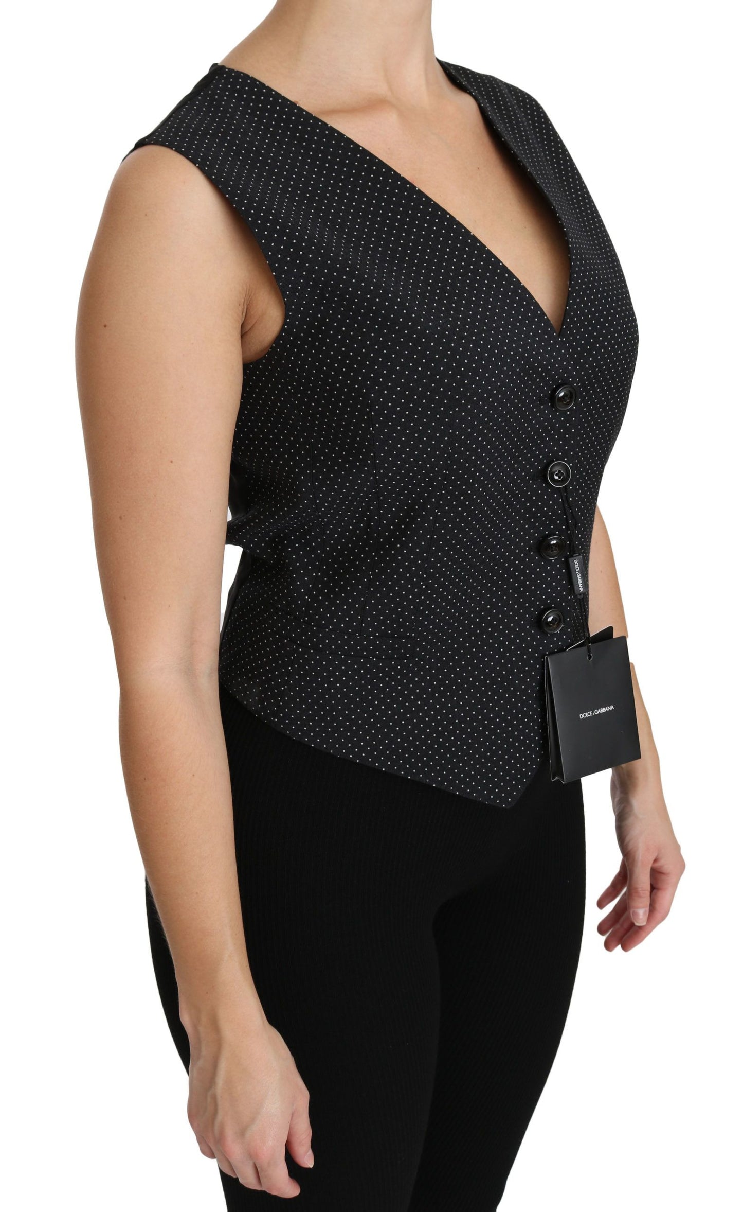 Top in camicetta con gilet punteggiato nero