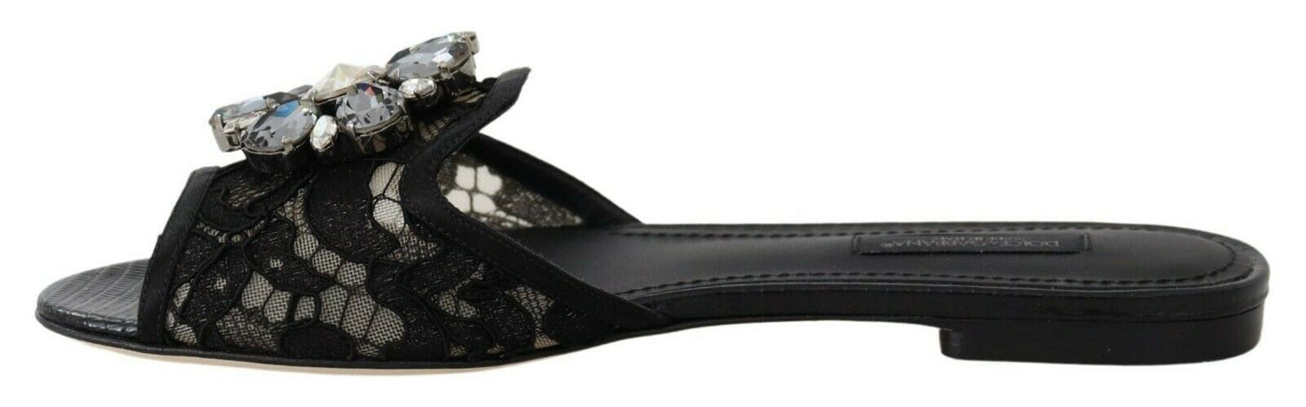 Dolce &amp; Gabbana – Elegante Pantoletten aus schwarzer Spitze mit Schmuckblumendetail