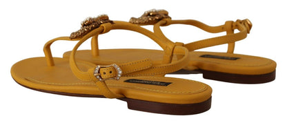 Dolce &amp; Gabbana – Senfgelbe, flache Sandalen mit T-Riemen und Herzverzierung