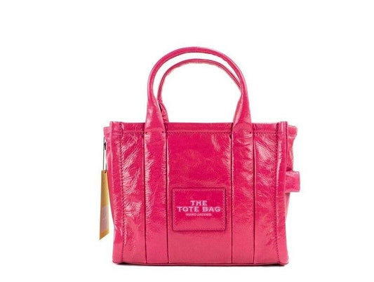 La borsa a tracolla in pelle magenta mini tote lucida increspata