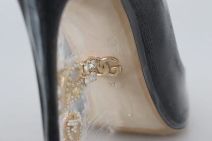 Dolce &amp; Gabbana Elegante Pumps mit schwarzem und goldenem Detail