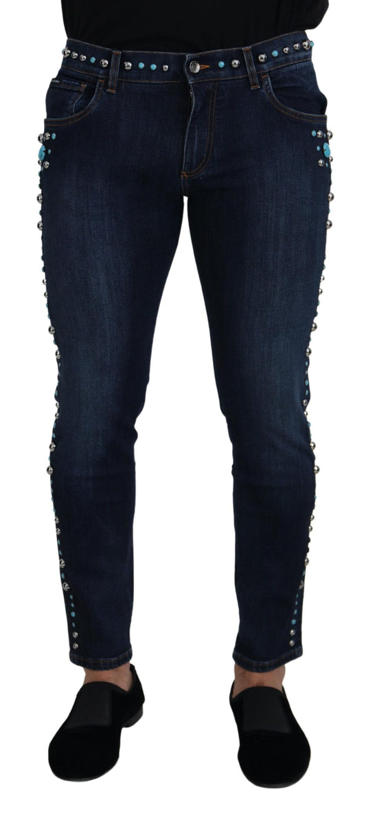 Jeans in denim a vita bassa con borchie in cotone blu