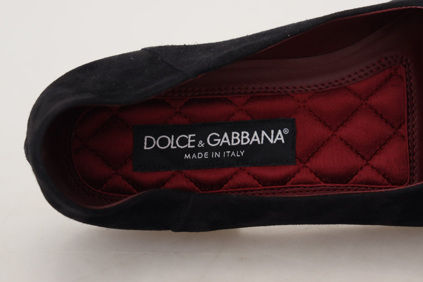 Mocassini slip-on con croce dorata in pelle scamosciata nera