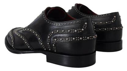 Scarpe derby borchiate in pelle nera