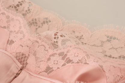 Dolce &amp; Gabbana – Elegante, ärmellose Bluse aus transparenter Spitze in Pink