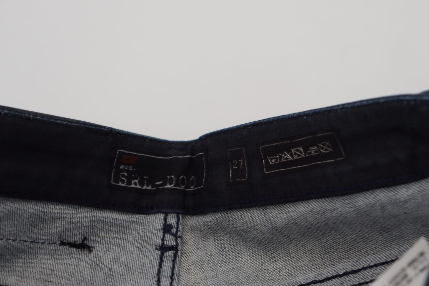 Jeans in denim di cotone slim fit a vita bassa lavati blu