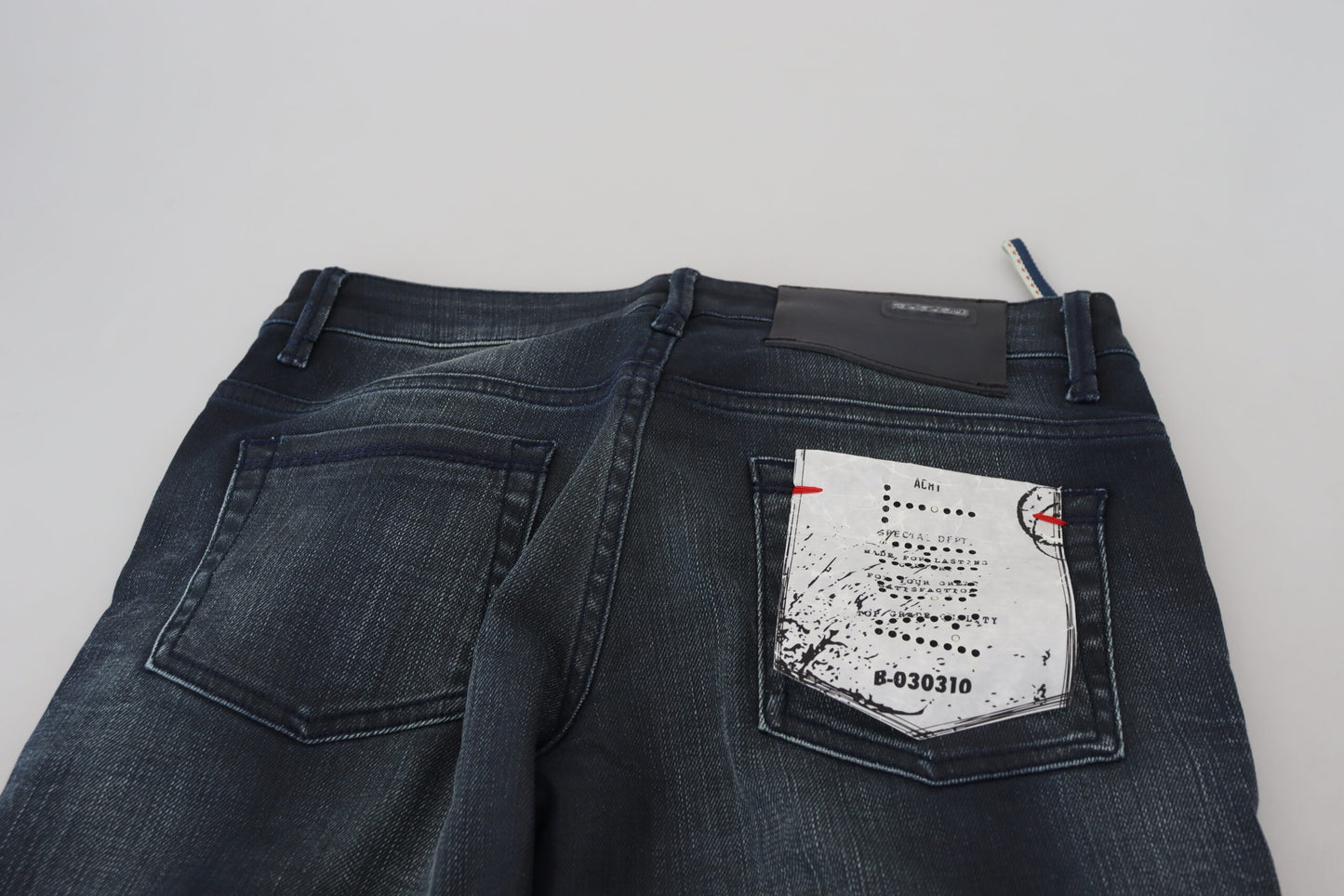 Jeans in denim di cotone slim fit a vita bassa lavati blu