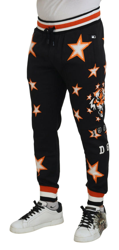 Pantaloni sportivi con stella nera arancione