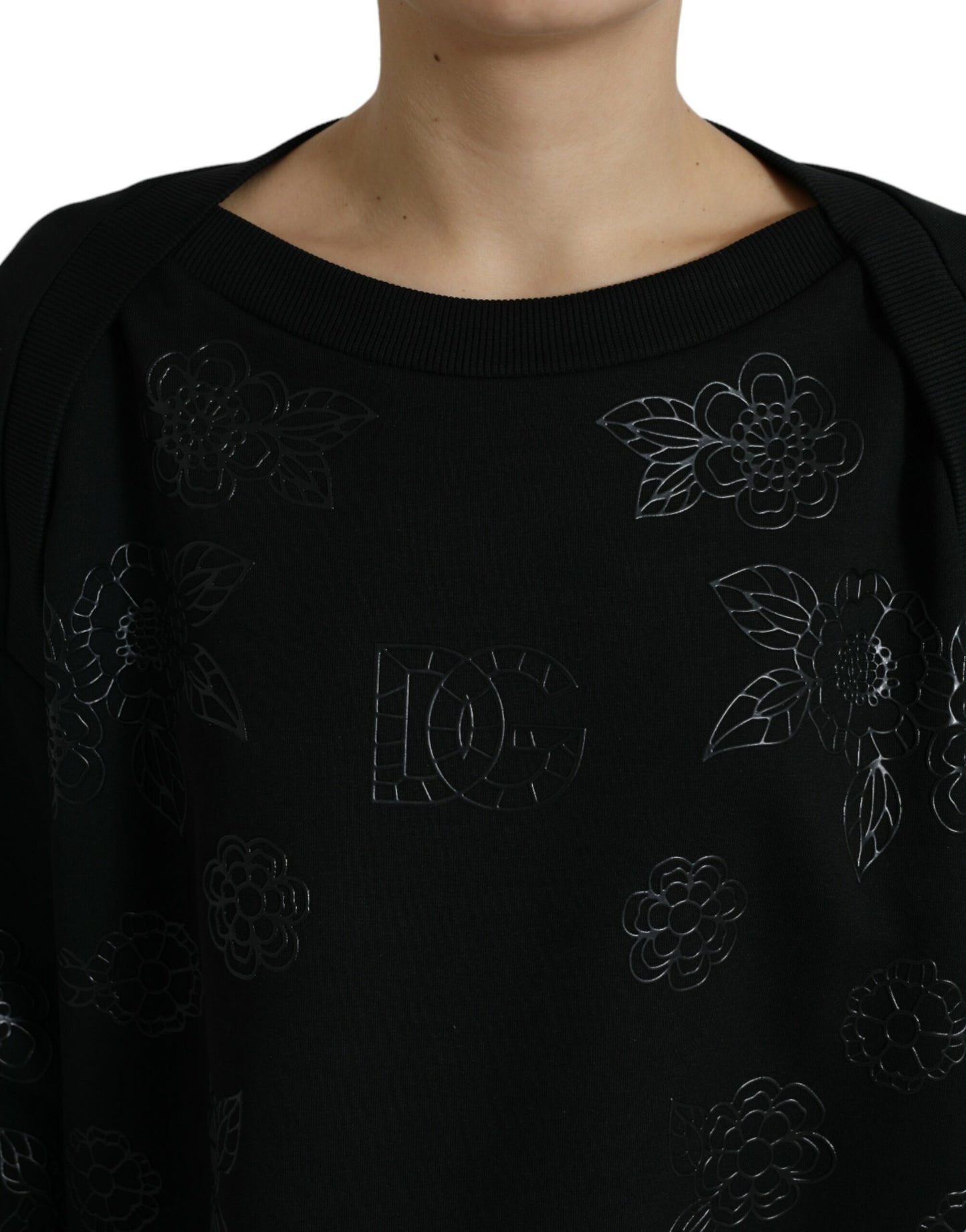 Dolce &amp; Gabbana Eleganter schwarzer Pullover mit Blumenapplikation