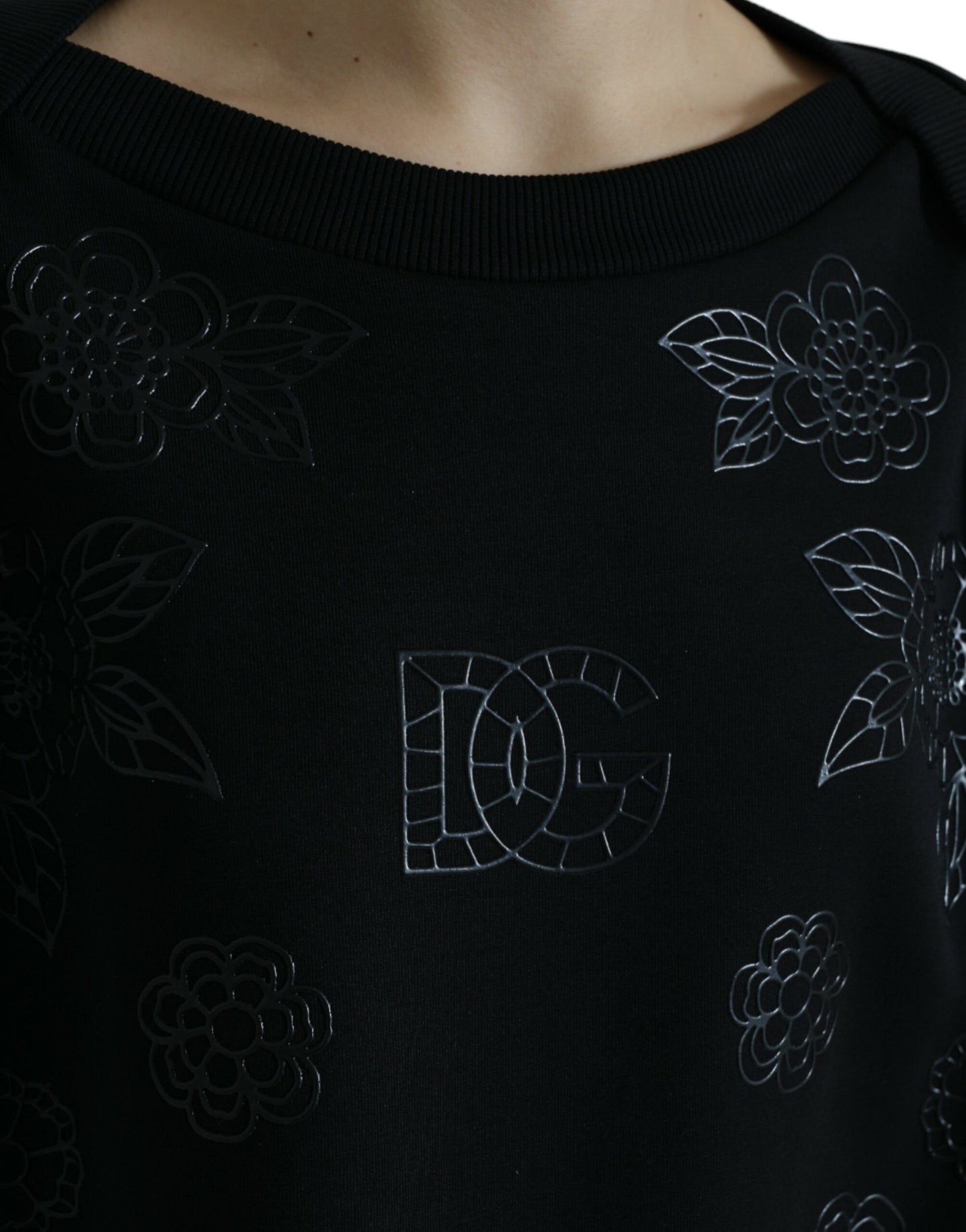 Dolce &amp; Gabbana Eleganter schwarzer Pullover mit Blumenapplikation