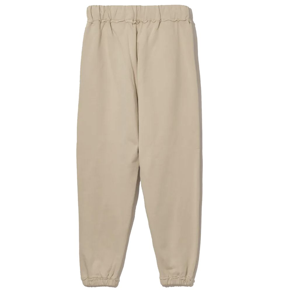 Comme Des Fuckdown – Schicke Jogginghose aus Baumwolle in Beige mit ausgefransten Details