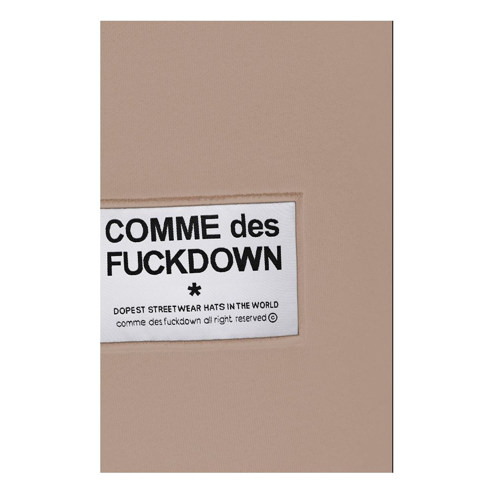 Comme Des Fuckdown – Schicke Jogginghose aus Baumwolle in Beige mit ausgefransten Details