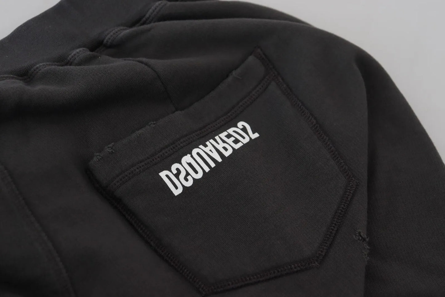 Dsquared² – Schwarze, zerfetzte, konische Shorts aus Baumwolle mit mittlerer Taille