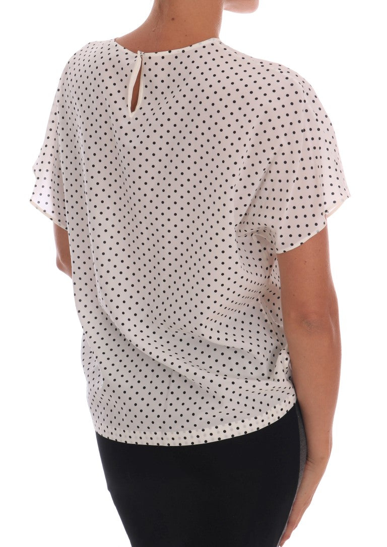 Top T-shirt in seta bianca a pois