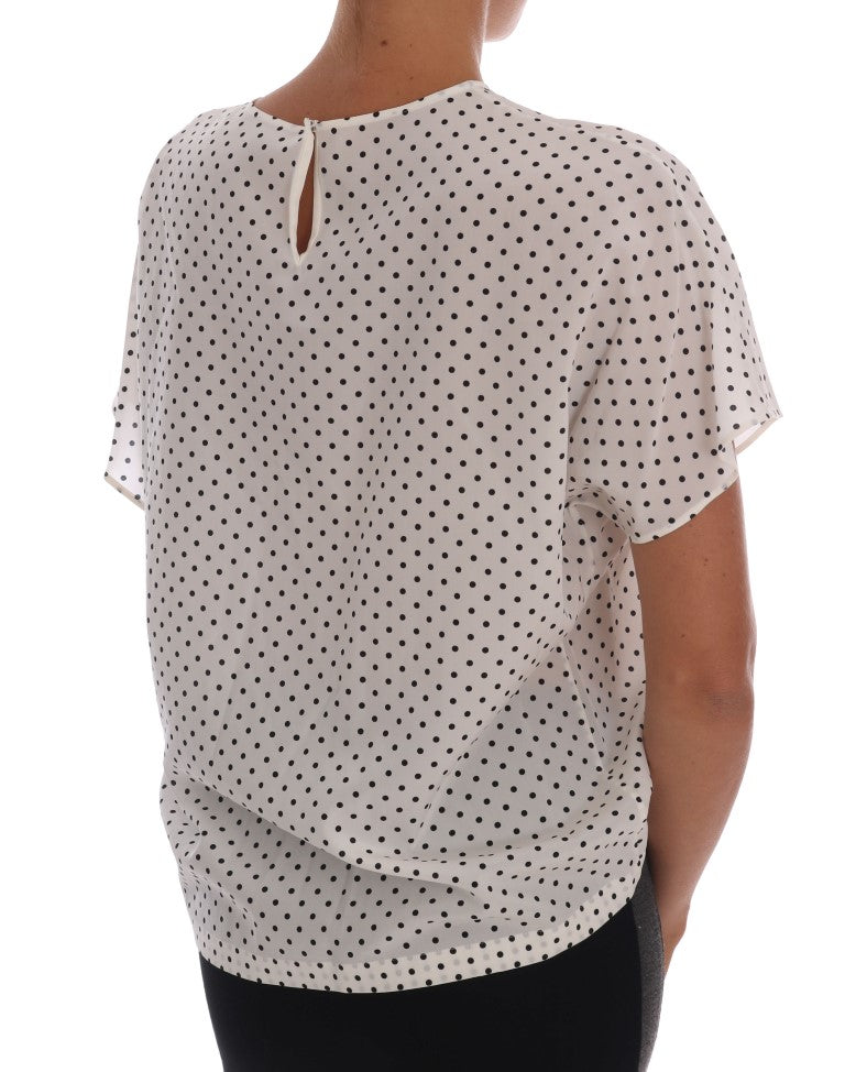 Top T-shirt in seta bianca a pois