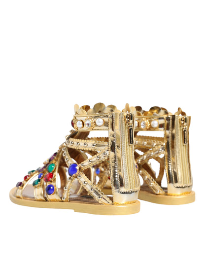 Dolce &amp; Gabbana – Gladiator-Sandalen aus goldenem Leder mit Kristallen, flache Schuhe