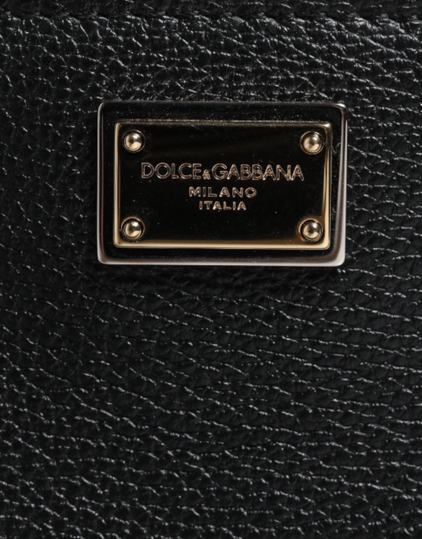 Dolce &amp; Gabbana – Clutch aus schwarzem genarbtem Leder mit Logo-Schild