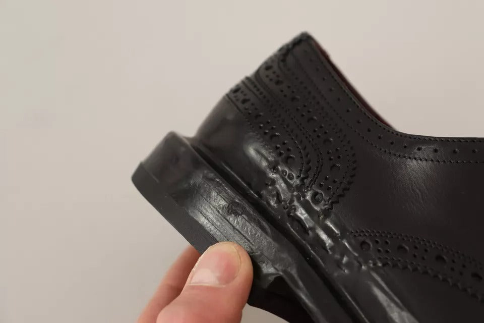 Dolce &amp; Gabbana – Schwarze Derby-Schnürschuhe aus perforiertem Leder